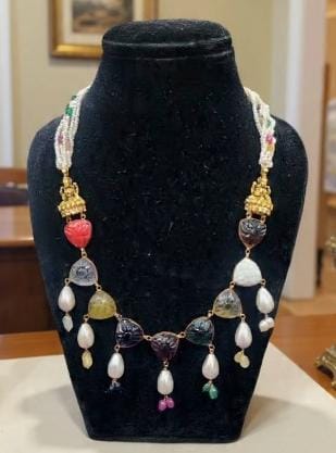 Before - Traditional jewelry set flat on table